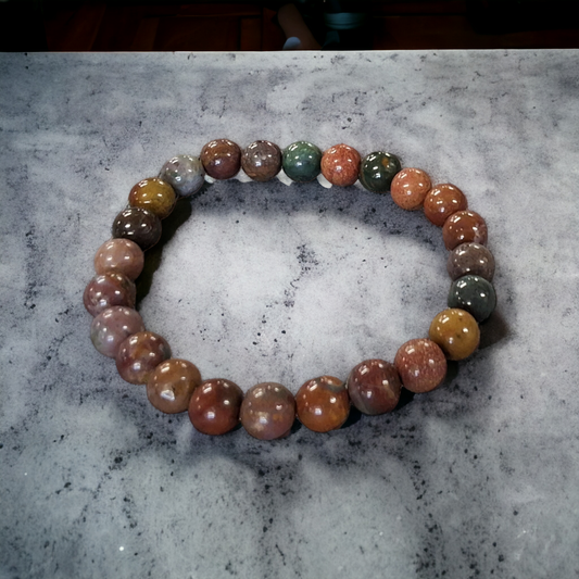 All shades of brown. This 7-7.5 inch bracelet contains 8mm size beads